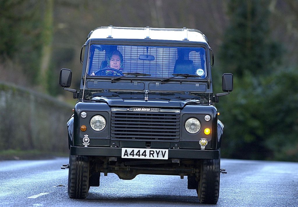 Queen driving famous Land Rover vehicle